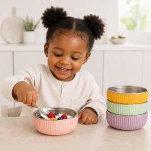 Garden Party ridged stainless steel kids bowls – kids eating from Garden Party ridged stainless steel bowls at the table – Monkey Proof
