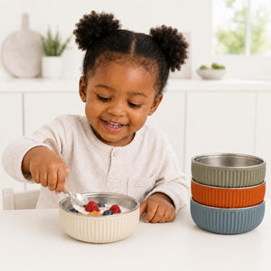 Arizona ridged stainless steel kids bowls – kids eating from Arizona ridged stainless steel bowls at the table – Monkey Proof